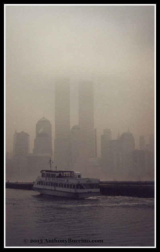 World Trade Center twin towers on a foggy afternoon, photo by Anthony Buccino