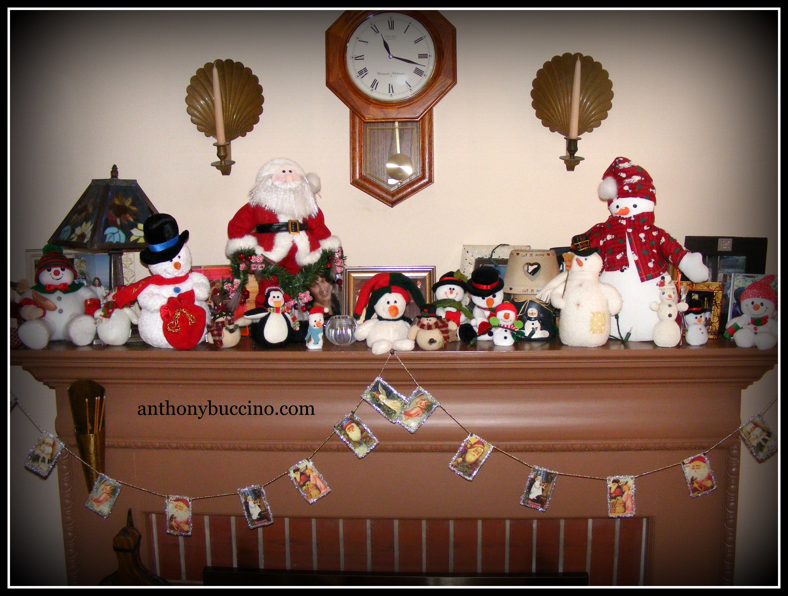 Snowmen on Fireplace Mantel by Anthony Buccino