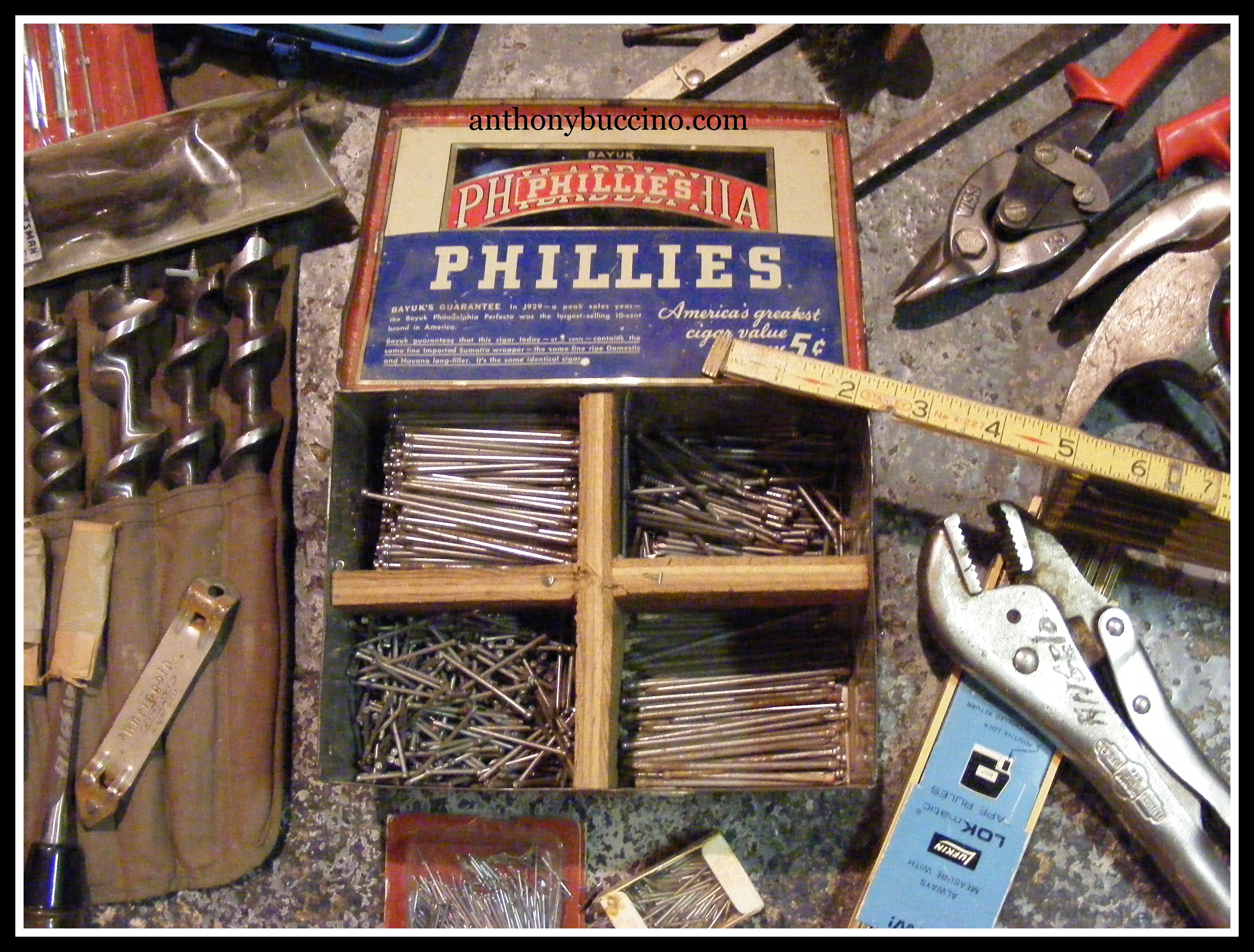 Dad's finishing nails and home-made storage tin, old hand drills 