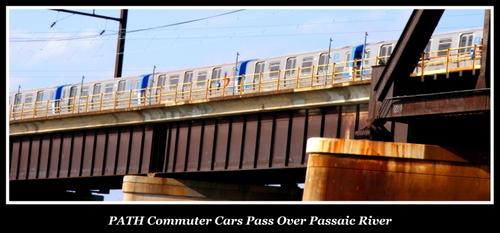 Path commuter trains cross Passaic River en route from Newark to New York,  A Buccino 